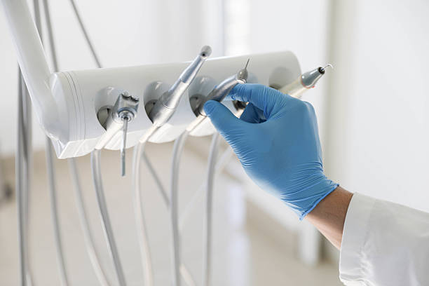 Professional Invisalign Clear Aligners technician working in Bridge City, TX